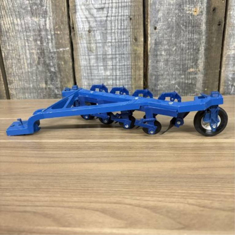 A Pair of Ertl Die-Cast 1/16 Scale Ford Farm Toy Implements