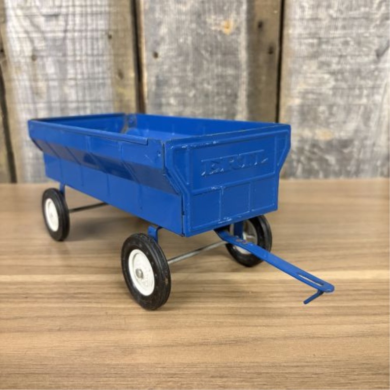 A Pair of Ertl Die-Cast 1/16 Scale Ford Farm Toy Implements