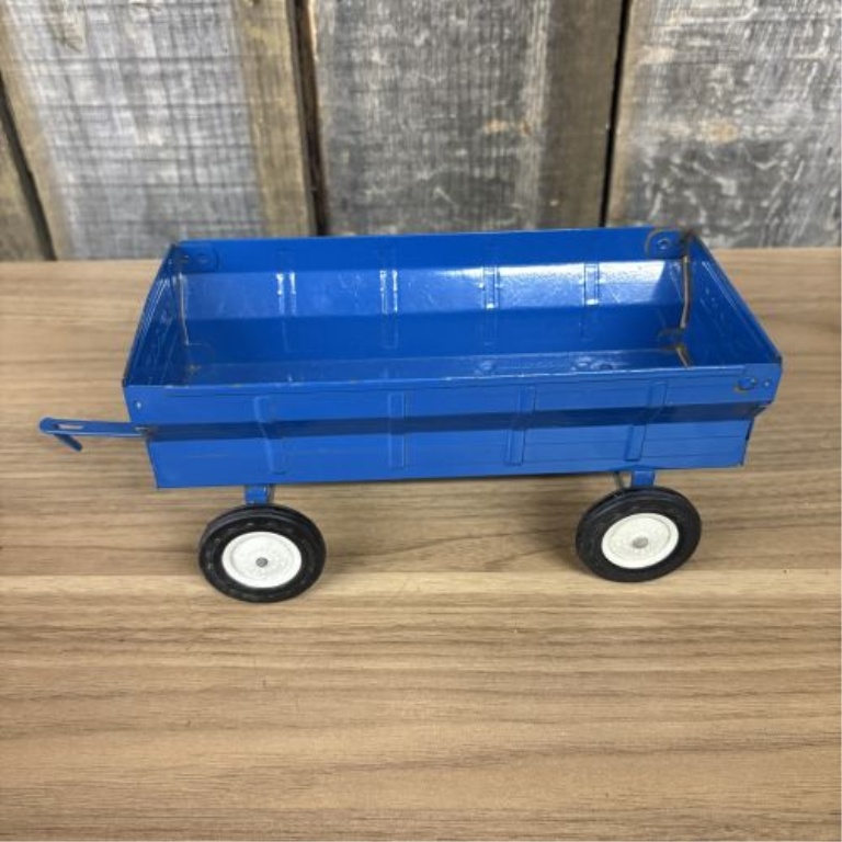 A Pair of Ertl Die-Cast 1/16 Scale Ford Farm Toy Implements