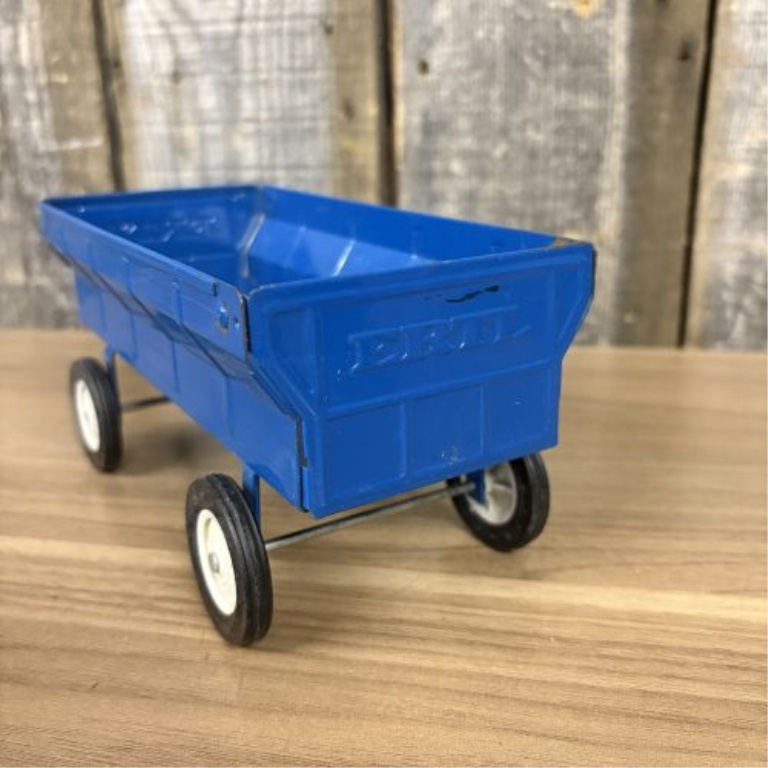 A Pair of Ertl Die-Cast 1/16 Scale Ford Farm Toy Implements
