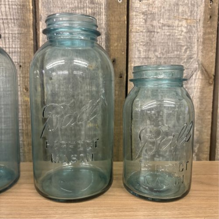 A Collection of Ball Perfect Mason Aqua Blue Glass Jars