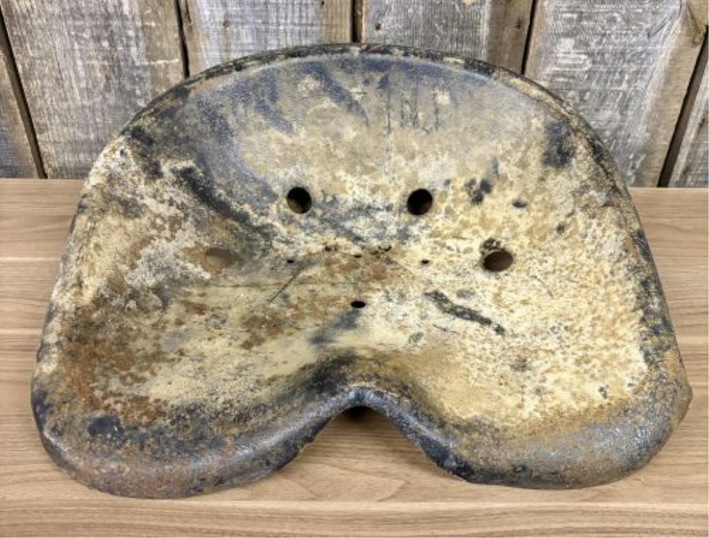 Vintage Cast Metal Pan-Style Tractor Seat with Pivoting Mounting Bracket