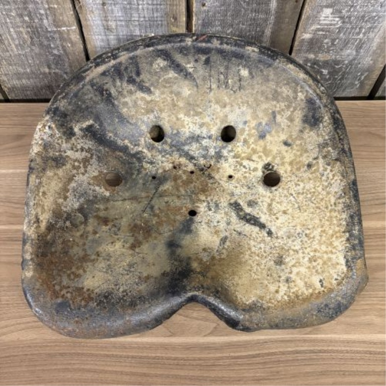 Vintage Cast Metal Pan-Style Tractor Seat with Pivoting Mounting Bracket