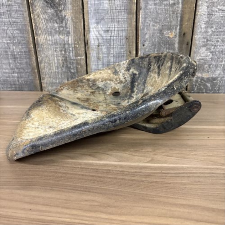 Vintage Cast Metal Pan-Style Tractor Seat with Pivoting Mounting Bracket