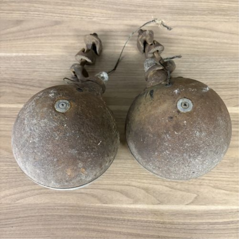 A Pair of Vintage Automotive Fog Lights with Bumper Mount Brackets