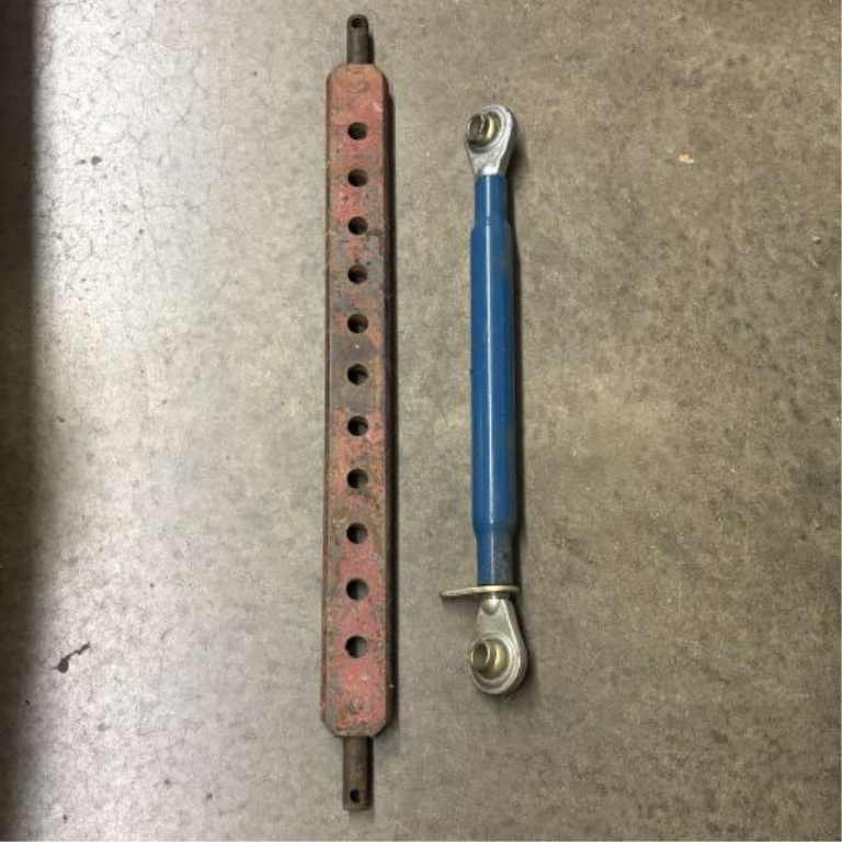 A Pair of Tractor Hitch Components Including Multi-Hole Drawbar and Adjustable Top Link