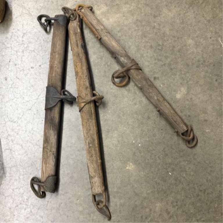 A Trio of Antique Wooden and Iron Horse-Drawn Singletrees