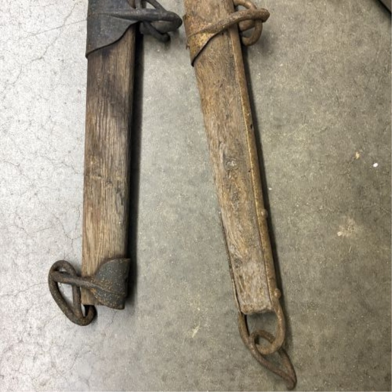 A Trio of Antique Wooden and Iron Horse-Drawn Singletrees