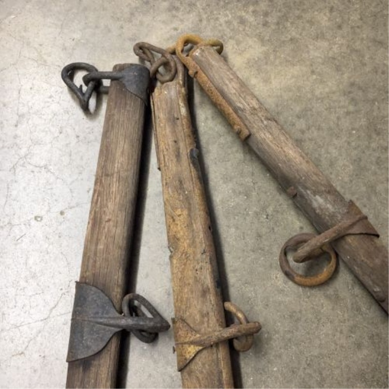 A Trio of Antique Wooden and Iron Horse-Drawn Singletrees