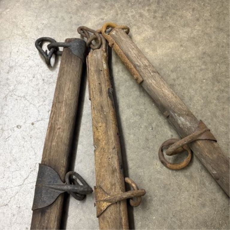 A Trio of Antique Wooden and Iron Horse-Drawn Singletrees