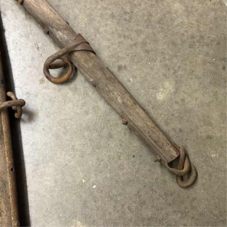 A Trio of Antique Wooden and Iron Horse-Drawn Singletrees