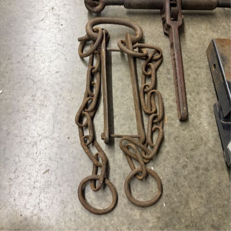 A Trio of Heavy-Duty Rigging and Towing Tools Including Ratchet Load Binder, Chain Assembly, and 2-5/16 Inch Ball Mount