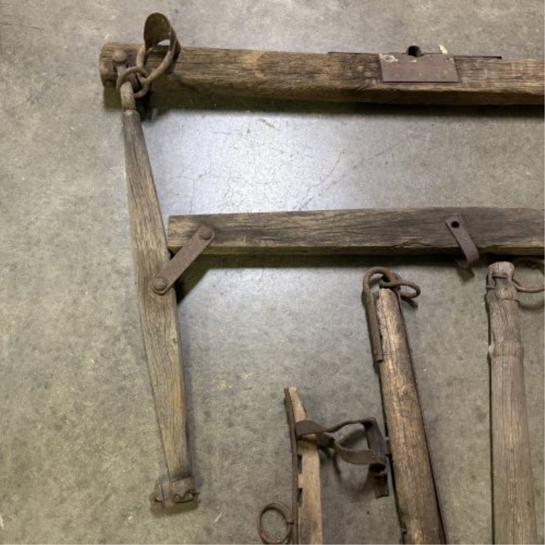 An Assortment of Antique Wood and Iron Horse-Drawn Vehicle and Harness Components