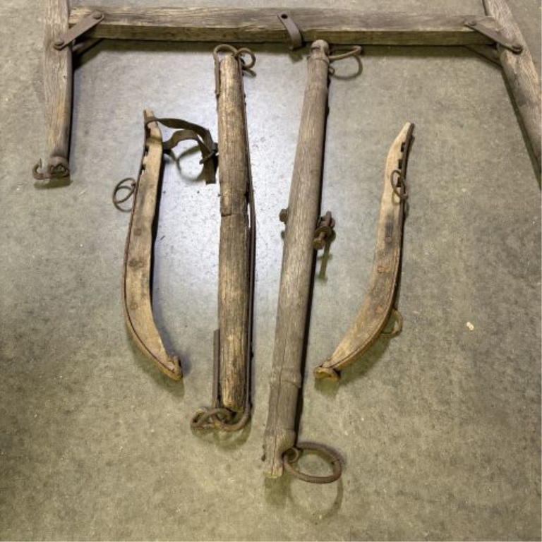 An Assortment of Antique Wood and Iron Horse-Drawn Vehicle and Harness Components