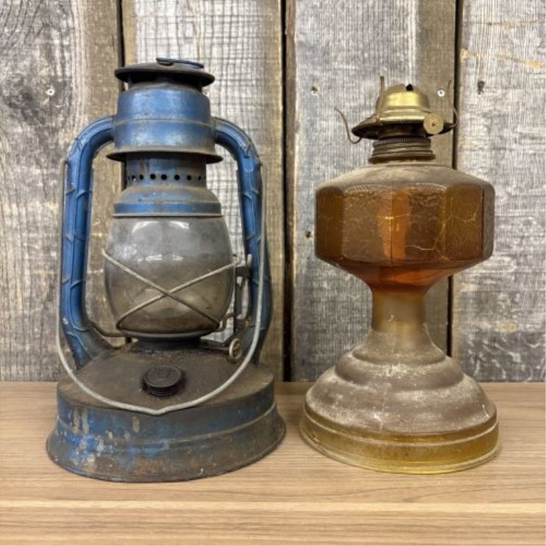 Two Vintage Portable Lamps Including a No. 100 Hurricane Lantern and an Amber Glass Lamp