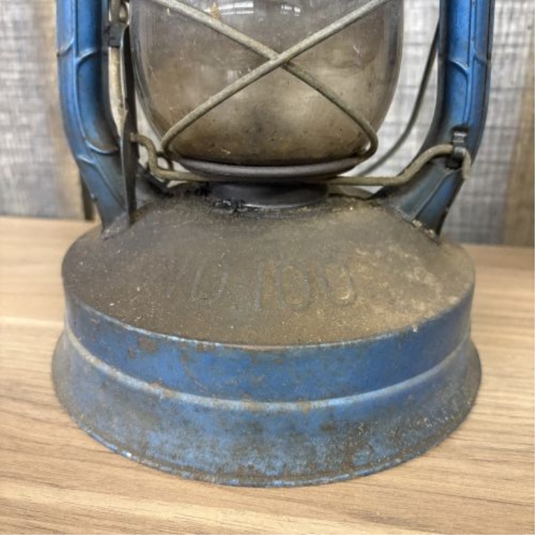 Two Vintage Portable Lamps Including a No. 100 Hurricane Lantern and an Amber Glass Lamp