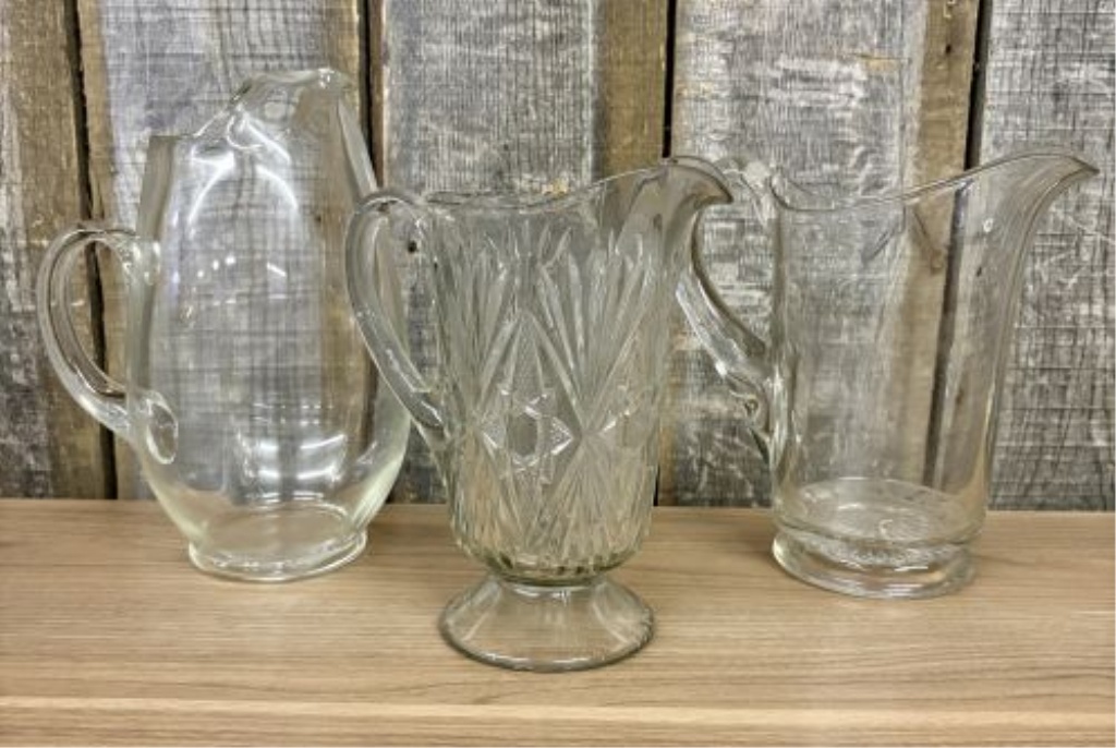 A Trio of Vintage Clear Glass Water Pitchers
