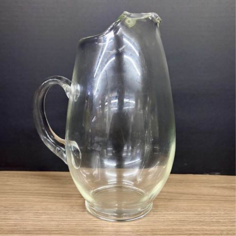 A Trio of Vintage Clear Glass Water Pitchers
