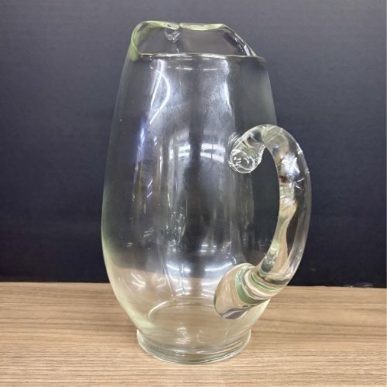 A Trio of Vintage Clear Glass Water Pitchers