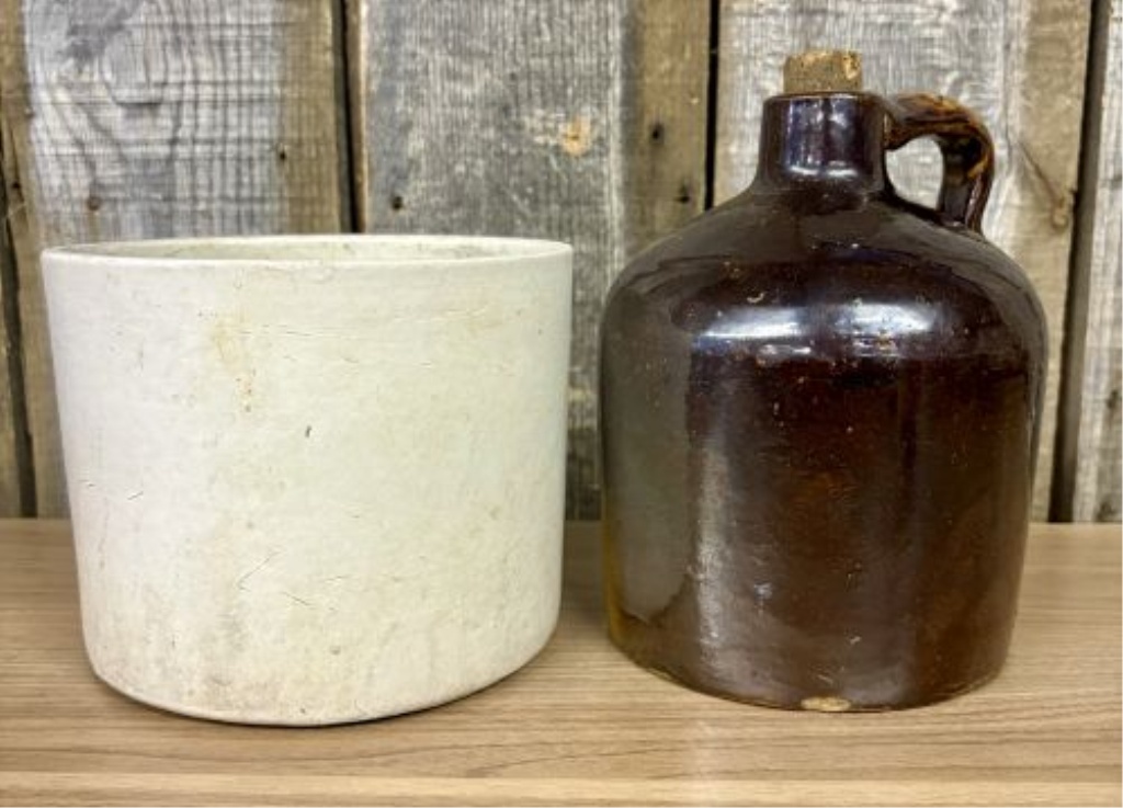 Two Pieces of American Utilitarian Stoneware Including a Two-Tone Jug and a Cylindrical Crock