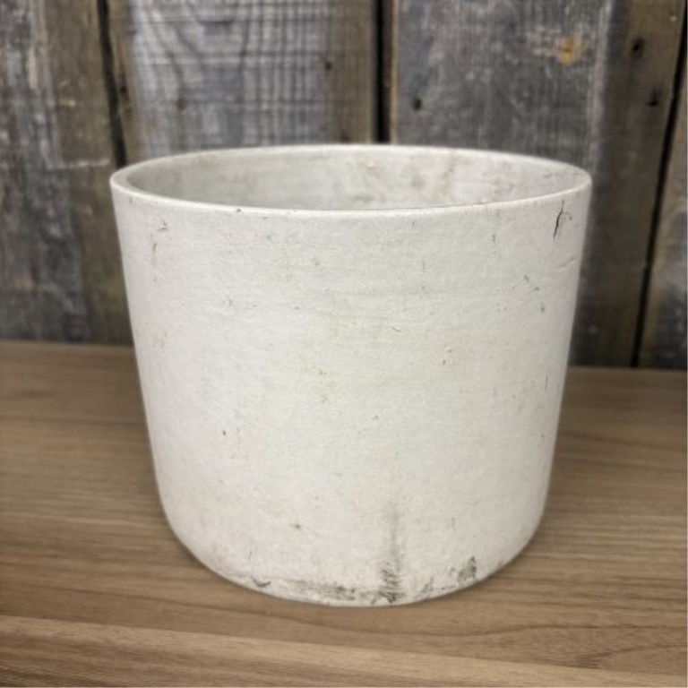 Two Pieces of American Utilitarian Stoneware Including a Two-Tone Jug and a Cylindrical Crock