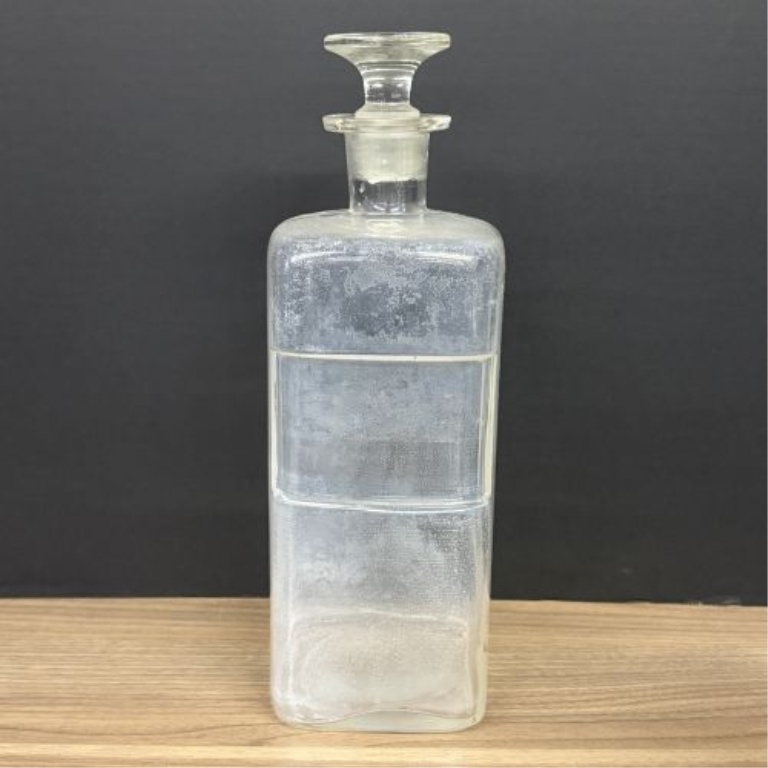 A Collection of Antique Clear Glass Apothecary Bottles Attributed to Whitall Tatum and Company