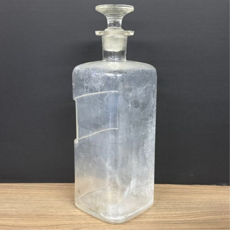 A Collection of Antique Clear Glass Apothecary Bottles Attributed to Whitall Tatum and Company