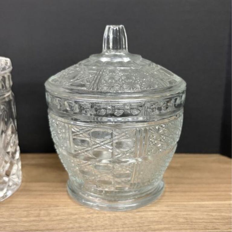 Seven Clear Glass Lidded Table Articles Including Pieces in the Style of Anchor Hocking Wexford