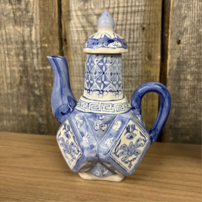 A Trio of Chinese Style Blue and White Porcelain Decorative Teapots