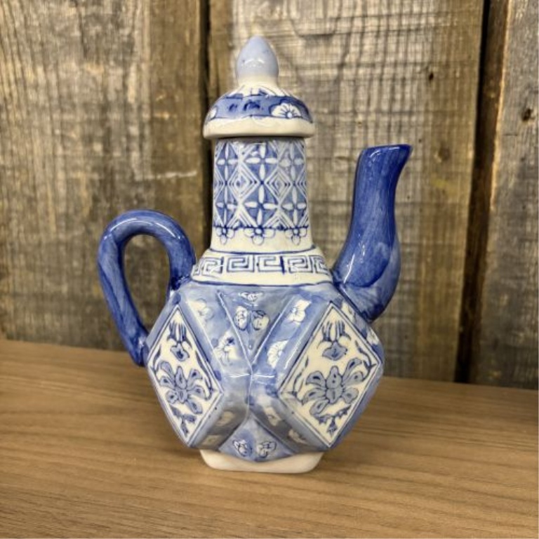 A Trio of Chinese Style Blue and White Porcelain Decorative Teapots