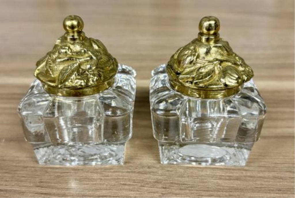 A Pair of Art Deco Style Cut Glass and Gilt Brass Salt and Pepper Shakers