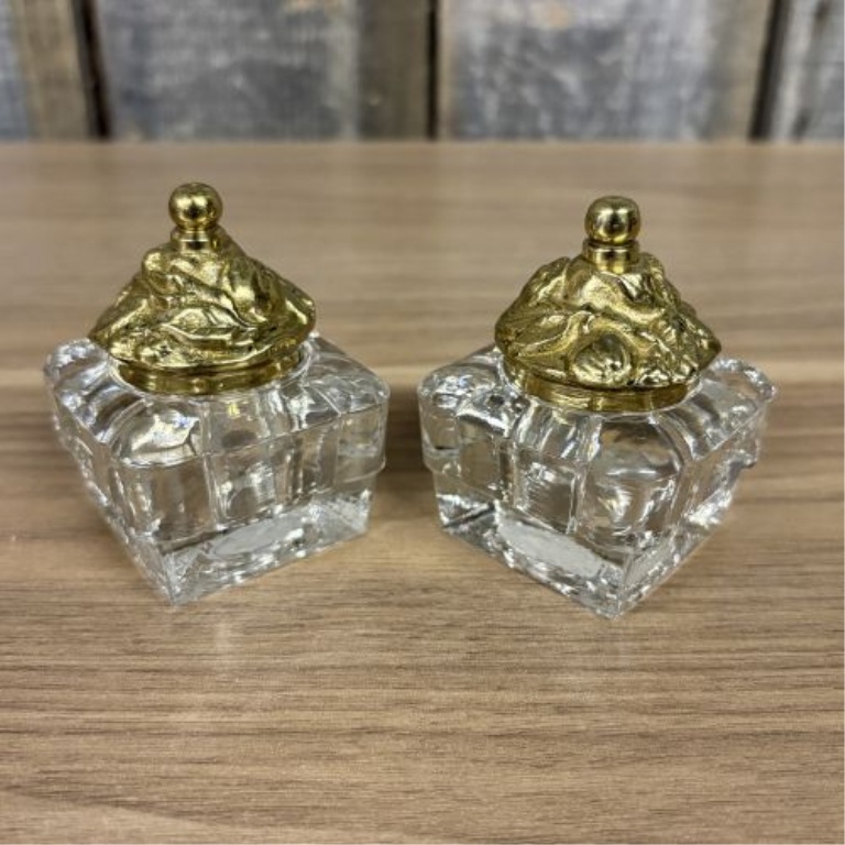 A Pair of Art Deco Style Cut Glass and Gilt Brass Salt and Pepper Shakers