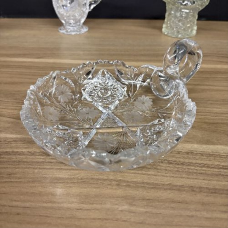 A Collection of Six Decorative Clear and Patterned Glass Articles Including American Brilliant Style Nappy and Candlesticks