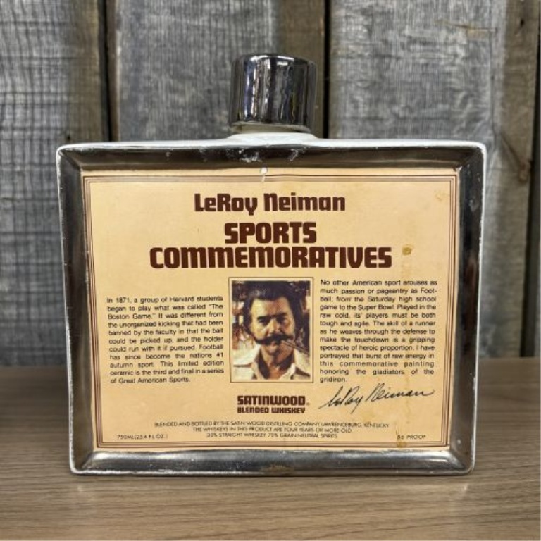 Two Ceramic Commemorative Decanters Including LeRoy Neiman Football and Liberty Bell