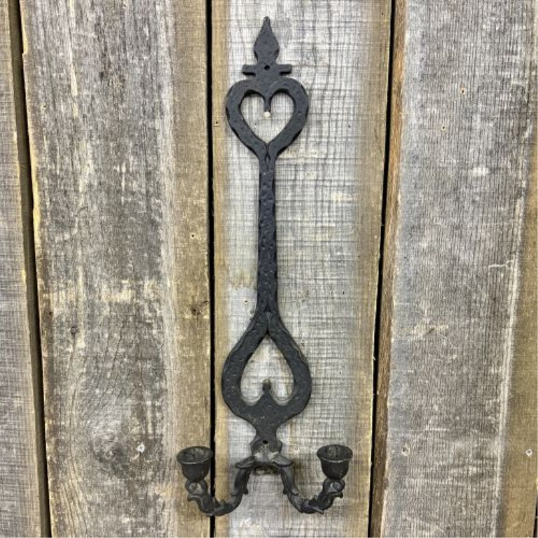 A Gothic Revival Style Cast Iron Two Arm Wall Sconce