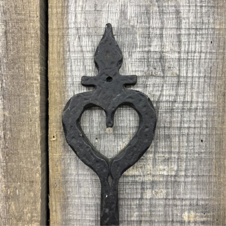 A Gothic Revival Style Cast Iron Two Arm Wall Sconce