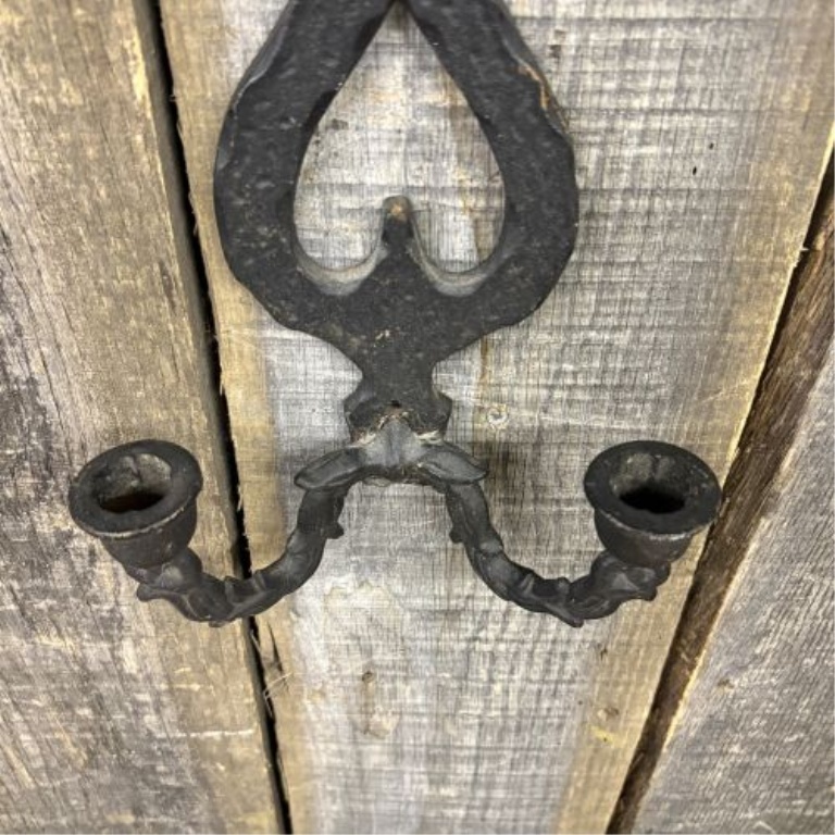 A Gothic Revival Style Cast Iron Two Arm Wall Sconce