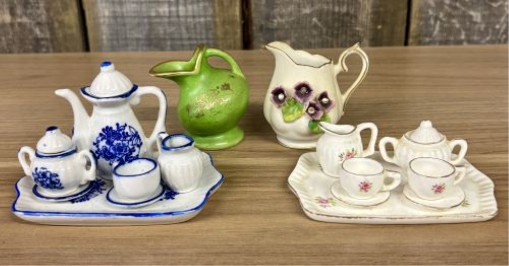 A Collection of 15 Miniature Porcelain Tea Service Pieces and Decorative Pitchers