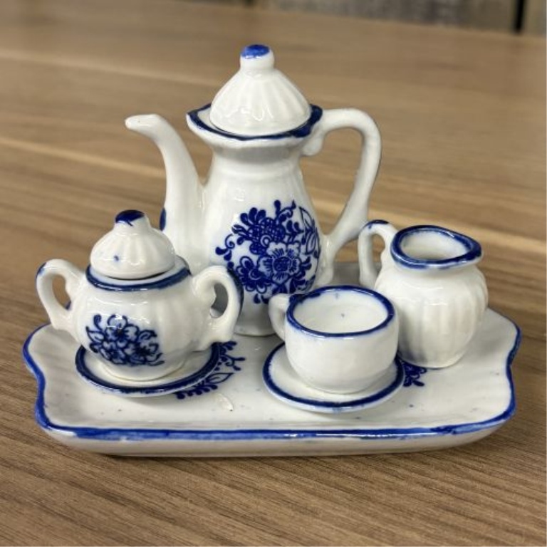 A Collection of 15 Miniature Porcelain Tea Service Pieces and Decorative Pitchers