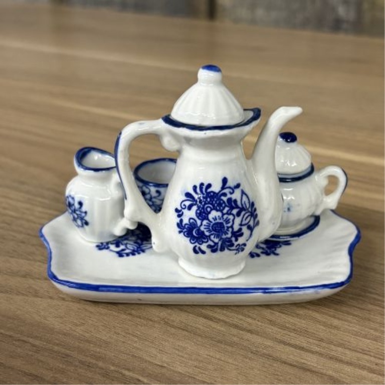 A Collection of 15 Miniature Porcelain Tea Service Pieces and Decorative Pitchers