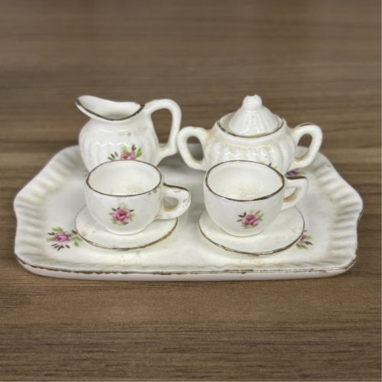 A Collection of 15 Miniature Porcelain Tea Service Pieces and Decorative Pitchers
