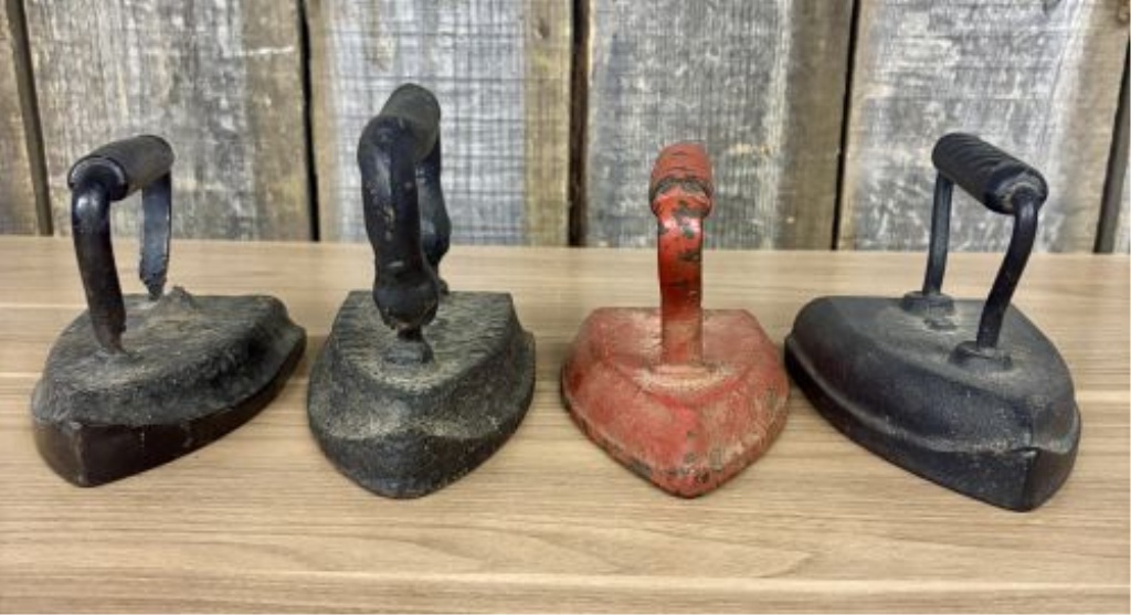 Collection of Four Antique Cast Iron Sad Irons