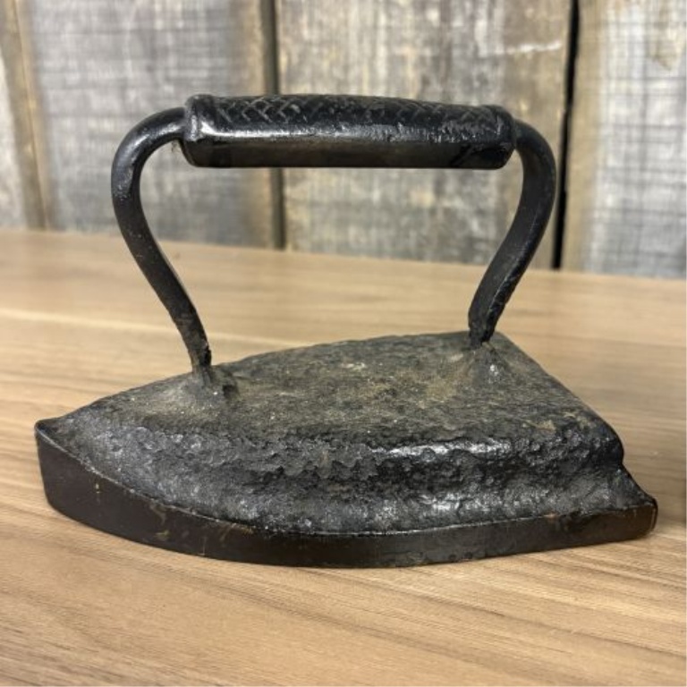 Collection of Four Antique Cast Iron Sad Irons