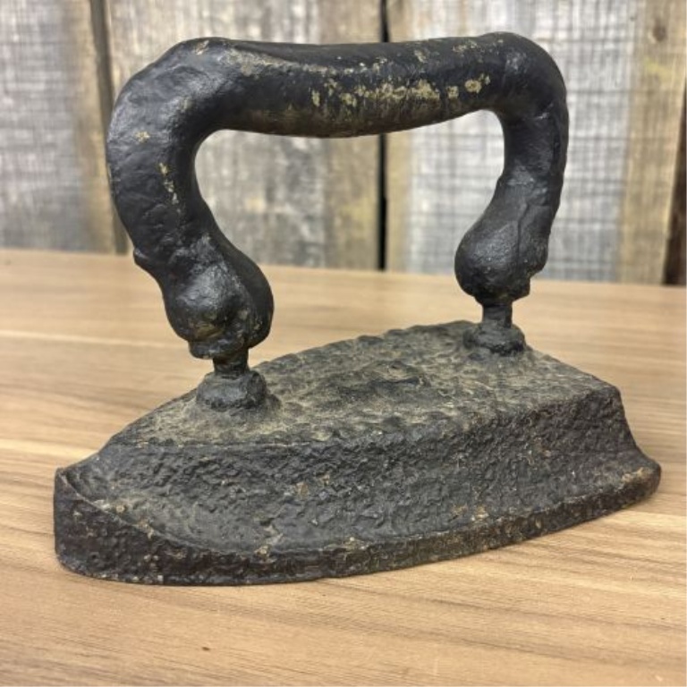 Collection of Four Antique Cast Iron Sad Irons