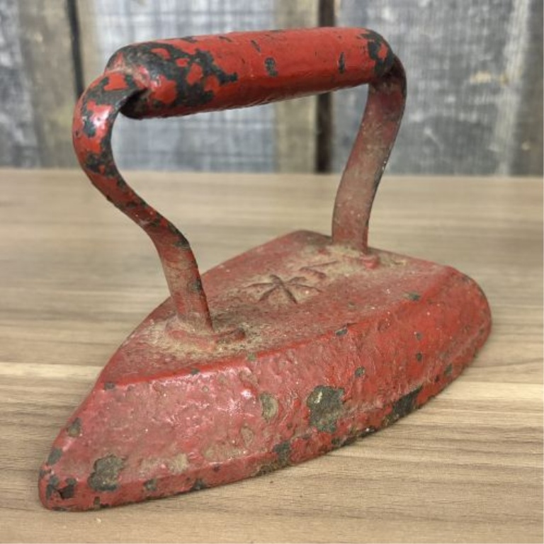 Collection of Four Antique Cast Iron Sad Irons