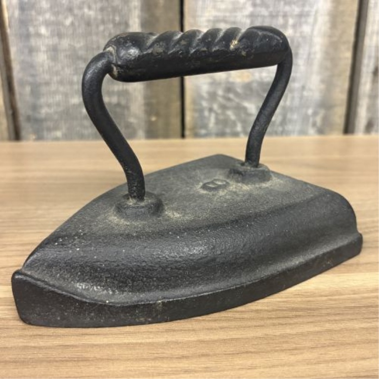 Collection of Four Antique Cast Iron Sad Irons