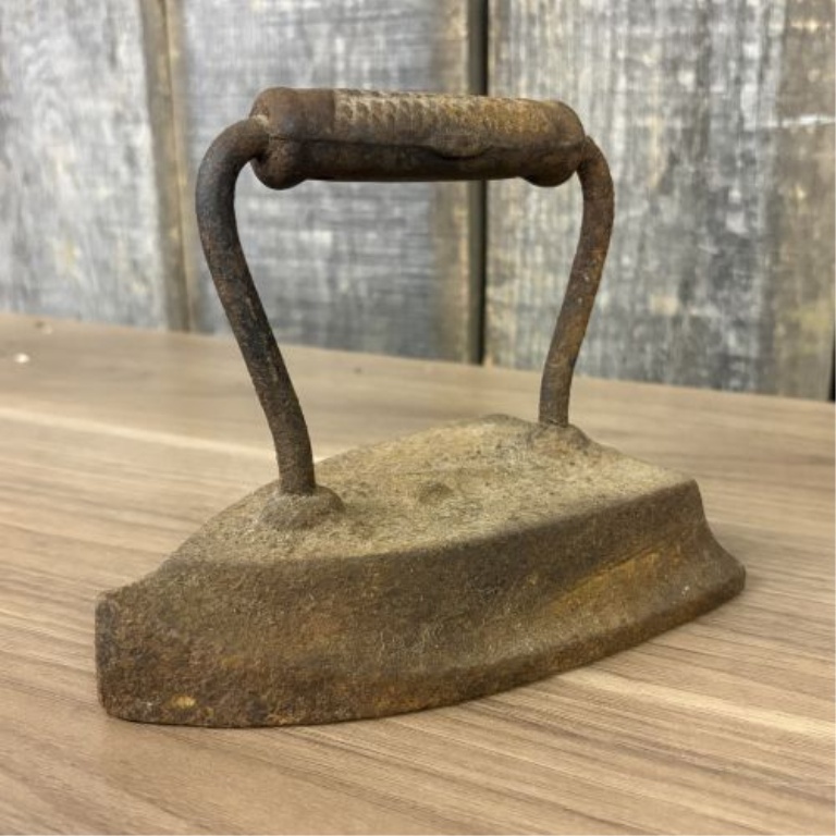 A Group of Four Antique Cast Iron Sad Irons Including Colebrookdale and Wapak Examples