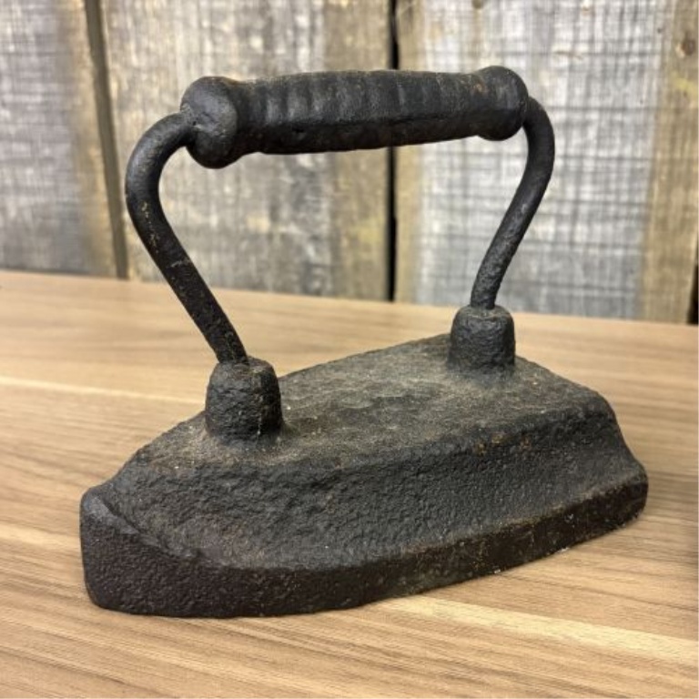 A Group of Four Antique Cast Iron Sad Irons Including Colebrookdale and Wapak Examples