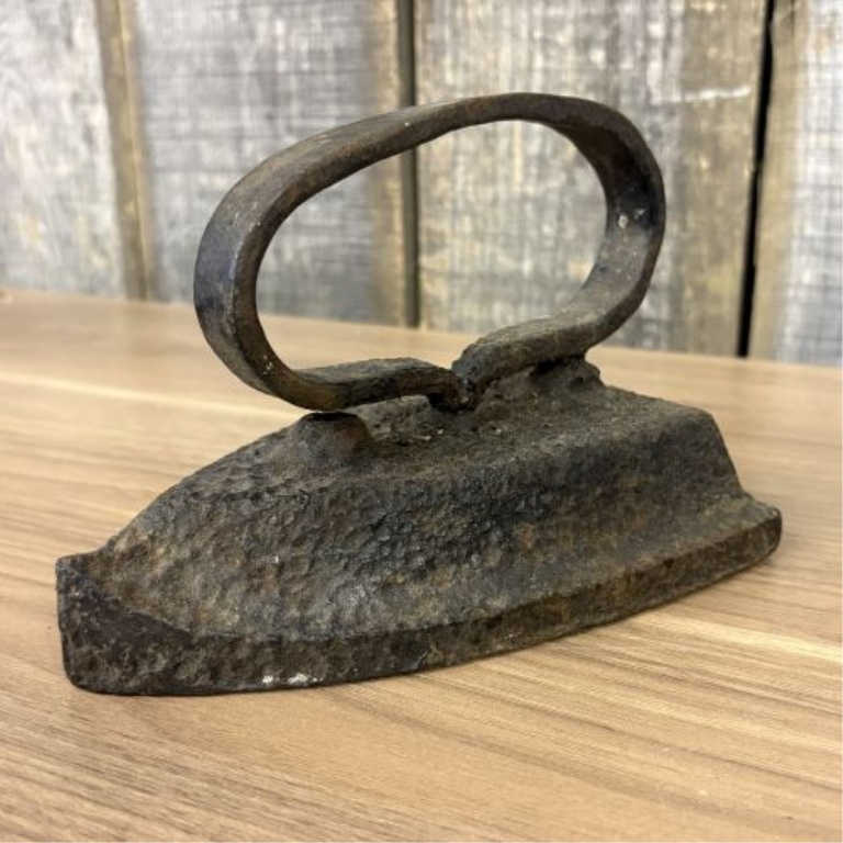 A Set of Four Antique Cast Iron Sad Irons