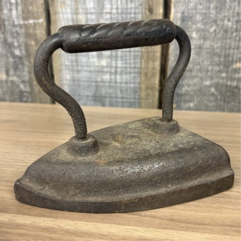 A Set of Four Antique Cast Iron Sad Irons